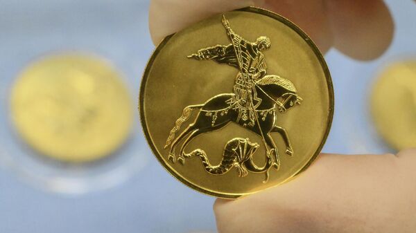 Россиянам рассказали о "двойной доходности" золотых монет