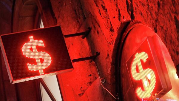 Аналитик объяснил падение доллара ниже 75 рублей