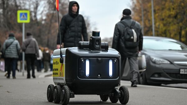 Путин осмотрел роботакси и роботов-доставщиков от Яндекса