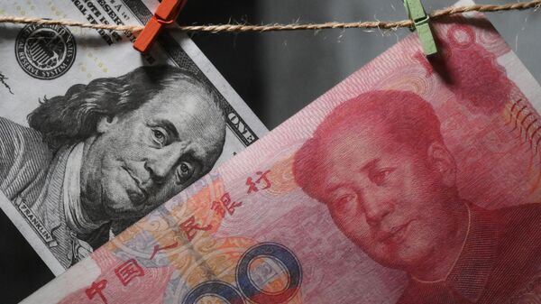 Курс доллара к юаню обновил минимум с апреля 2023 года